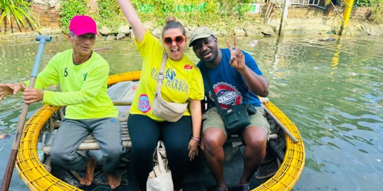 Indian tourists basket boat Hoi An coconut forest